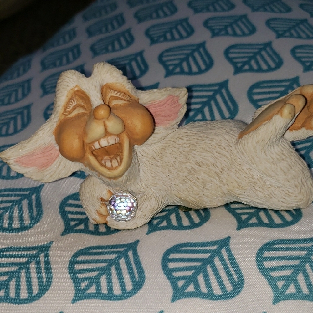 Whimsical Laughing Creature Figurine